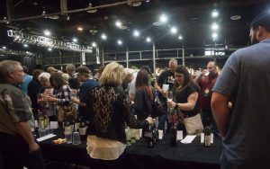 Festival goers enjoy wine and beer at the event