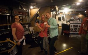 Forks, Corks & Kegs guests enjoying wine and more