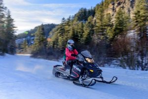 Snowmobiling in the mountains