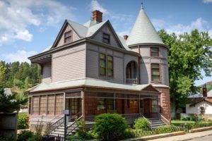 Historic Adams House on sunny day