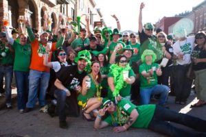 Group of adults in costume for St. Paddy's Day events in Deadwood