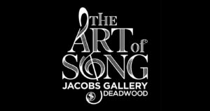 Logo for Art of Song event at Jacob's Gallery, Deadwood. Black background with white text. The letters A and O form a stylized treble clef.