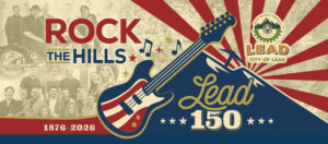 Rock The Hills - Celebrate Lead's 150th. Graphic shows a guitar, mountain and music notes with red and blue accents a parchment background.